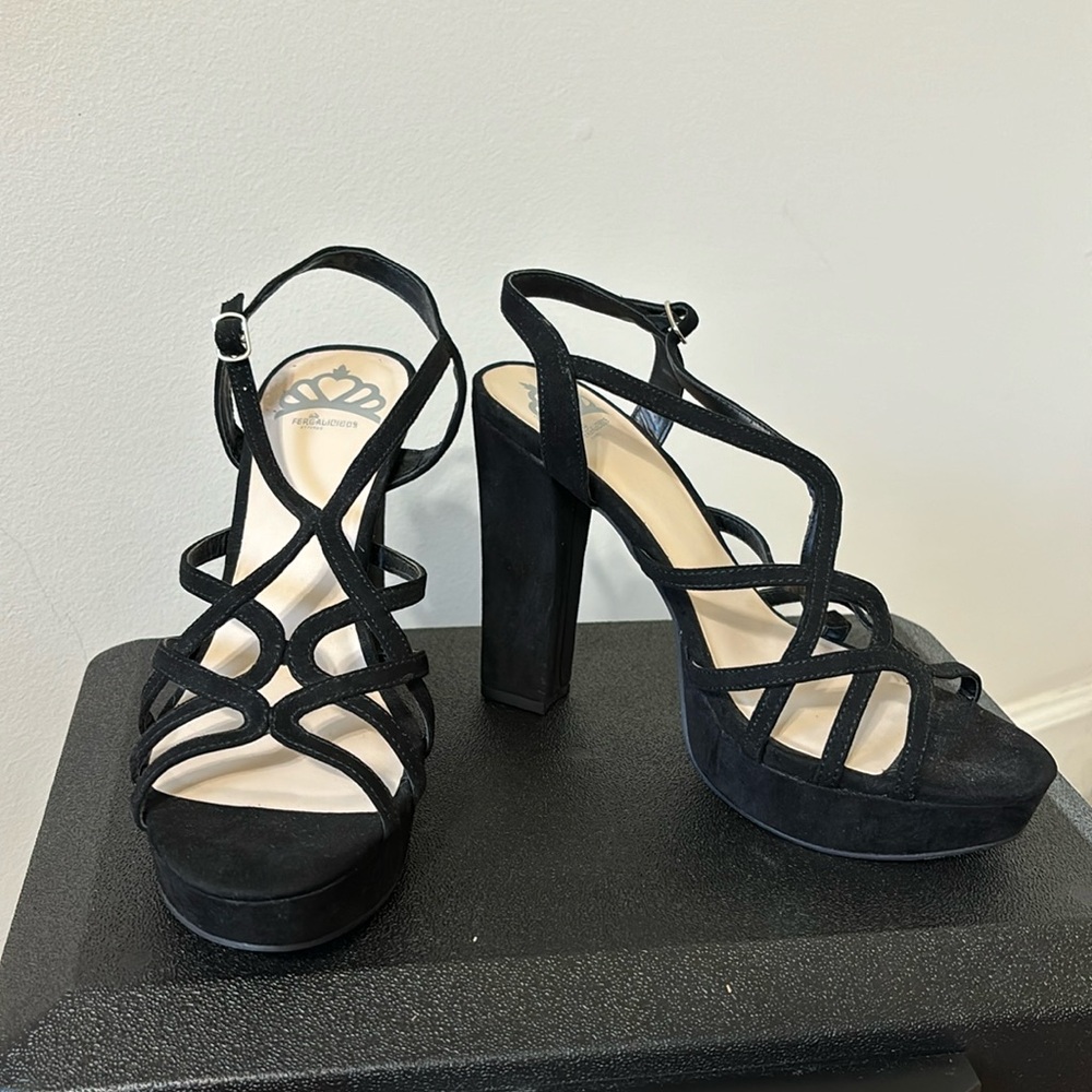Size 9 black heels. Never been worn